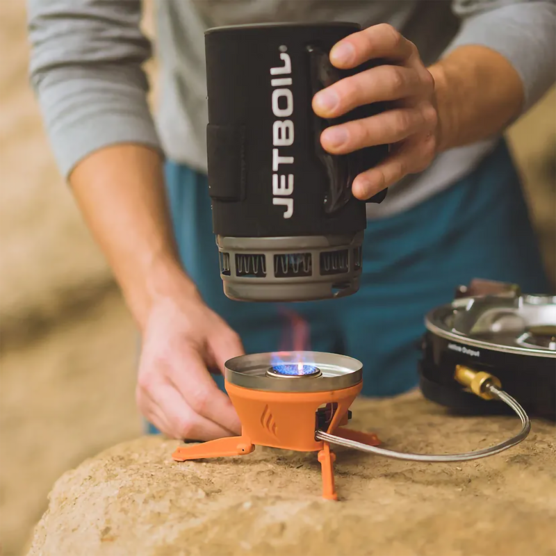 FluxRing Tall Spare Cup Carbon, Jetboil FluxRing Tall Spare Cup in Carbon with model with burner lit