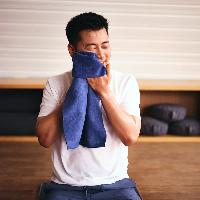 Equa Yoga Hand Towel, Manduka Equa Yoga Hand Towel in Midnight 2.0 with model
