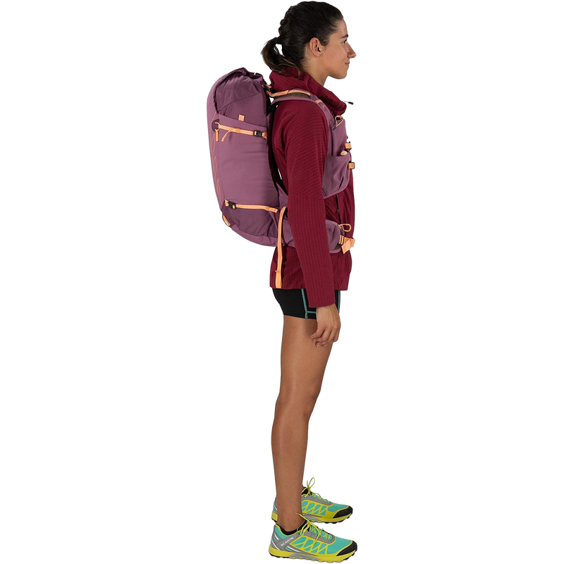 Women's Tempest Velocity 20, Osprey Tempest Velocity 20 in Pashmina/Melon on model right