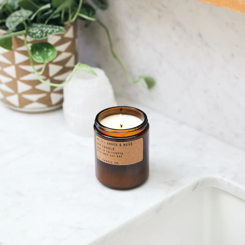 Amber & Moss 7.2oz Candle, P.F. Candle Co. Amber & Moss - 7.2oz on counter