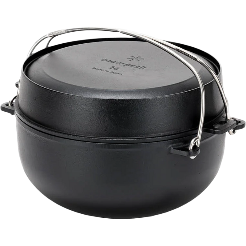 Japanese Cast Iron Oven, Snow Peak Cast Iron Oven angled with skillet as lid