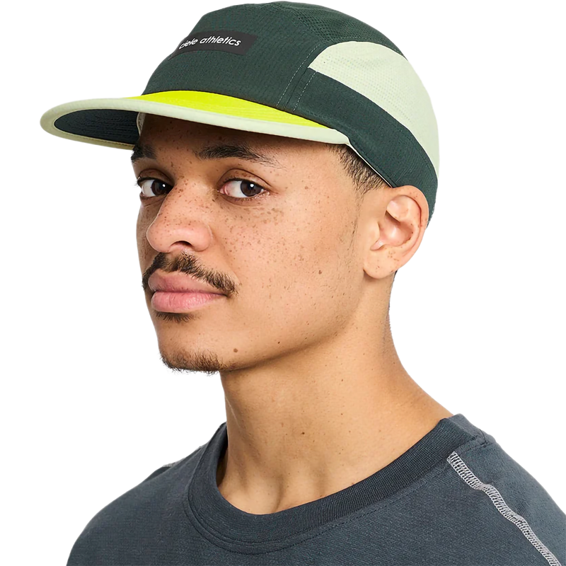 GOCap Field Iconic Bar, Ciele Athletics GOCap Field Iconic Bar in Spruce/Light Moss on model front left