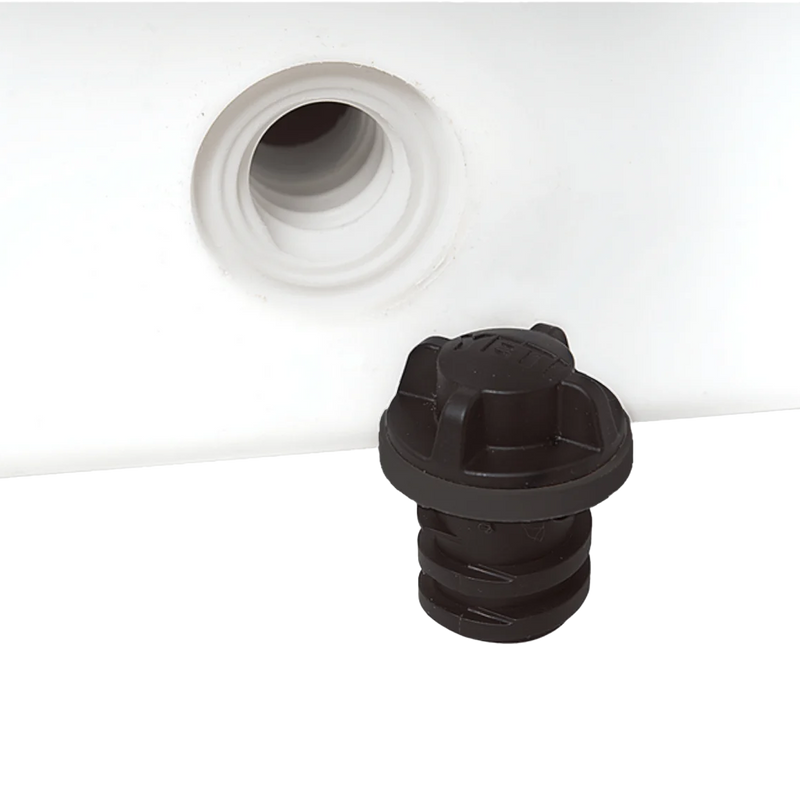 Yeti Drain Plug V2 1-Pack next to valve
