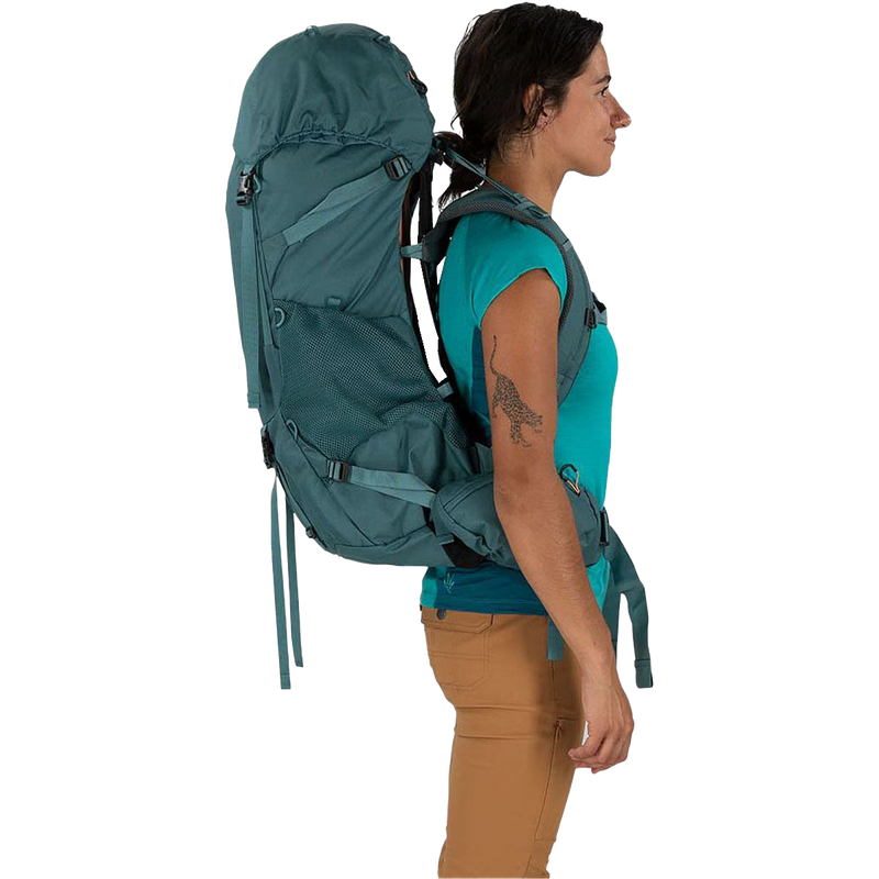 Women's Renn 50L, Osprey Renn 50L in Cascade Blue/Melon Orange on model right side
