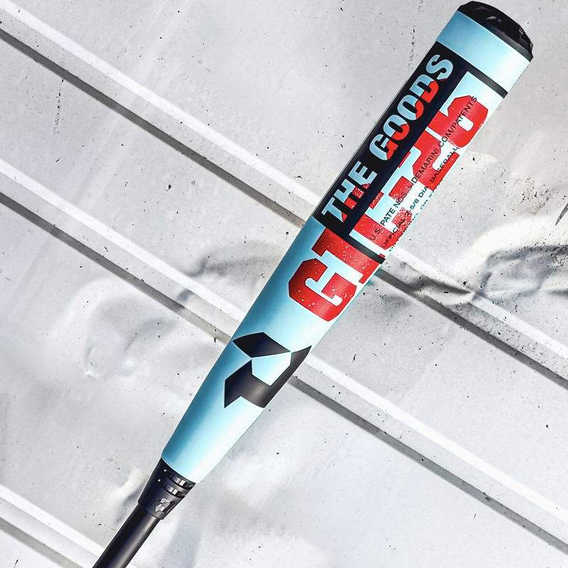 The Goods -3 BBCOR 2026, DeMarini The Goods -3 BBCOR 2026 in Tiffany/Red/Black on wall