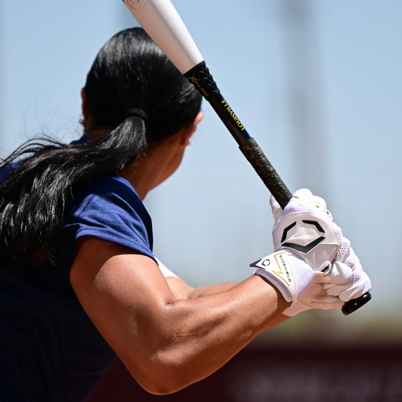 Carbyne Batting Glove with Wrist Wrap, EvoShield Carbyne Batting Glove with Wrist Wrap holding bat