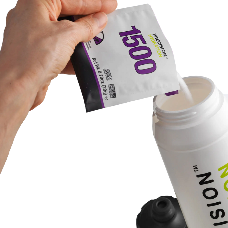 Precision Hydration Powder, Precision Fuel and Hydration Precision Hydration Powder in hand