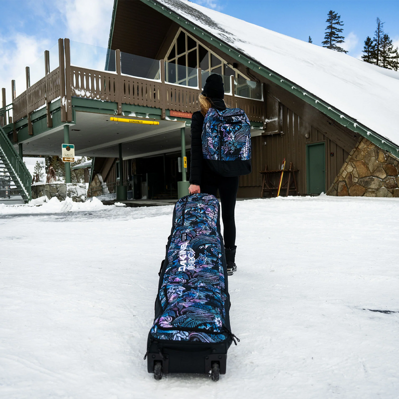 Low Roller Snowboard Bag X B4BC, DaKine Low Roller Snowboard Bag X B4BC with boarder