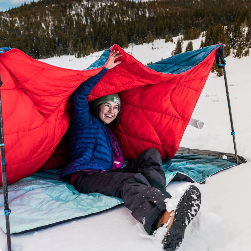 The Backcountry Puffy Blanket, Rumpl The Backcountry Puffy Blanket in Deepwater lifestyle photo 2
