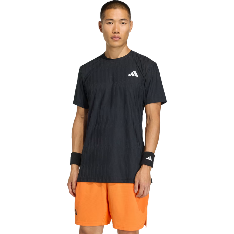 Men's FreeLift Tee, Adidas Men's FreeLift Tee in Black on model