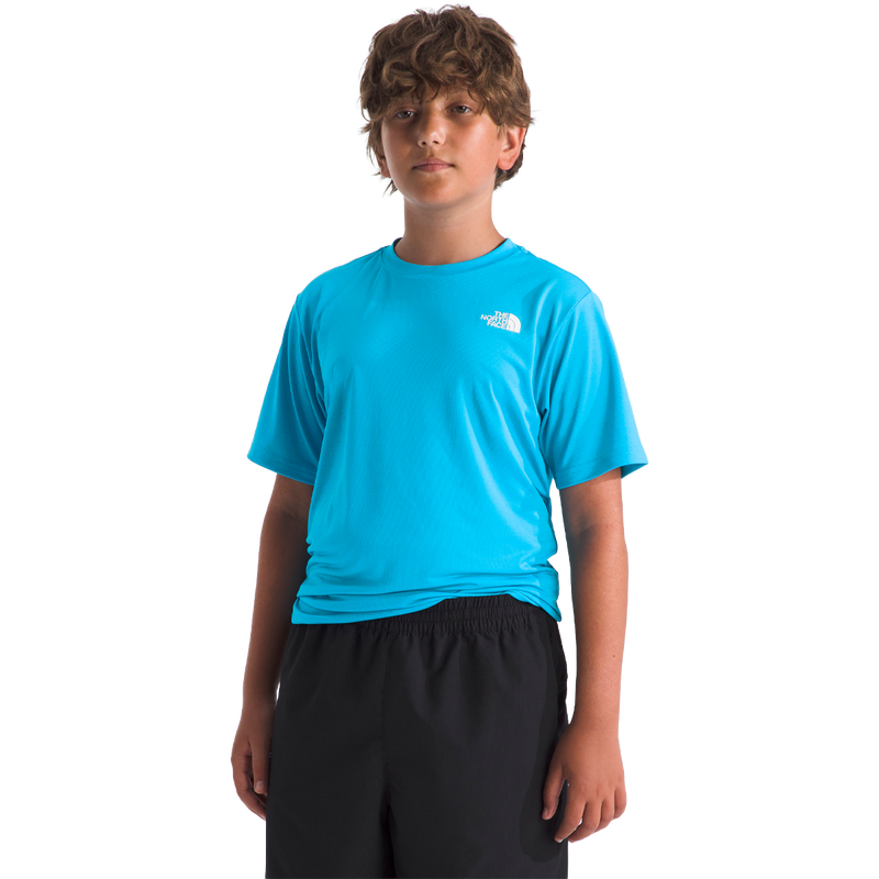 Youth Teen New 24/7 Short Sleeve Tee, The North Face Youth Teen New 24/7 Short Sleeve Tee in Meridian Blue front side on model