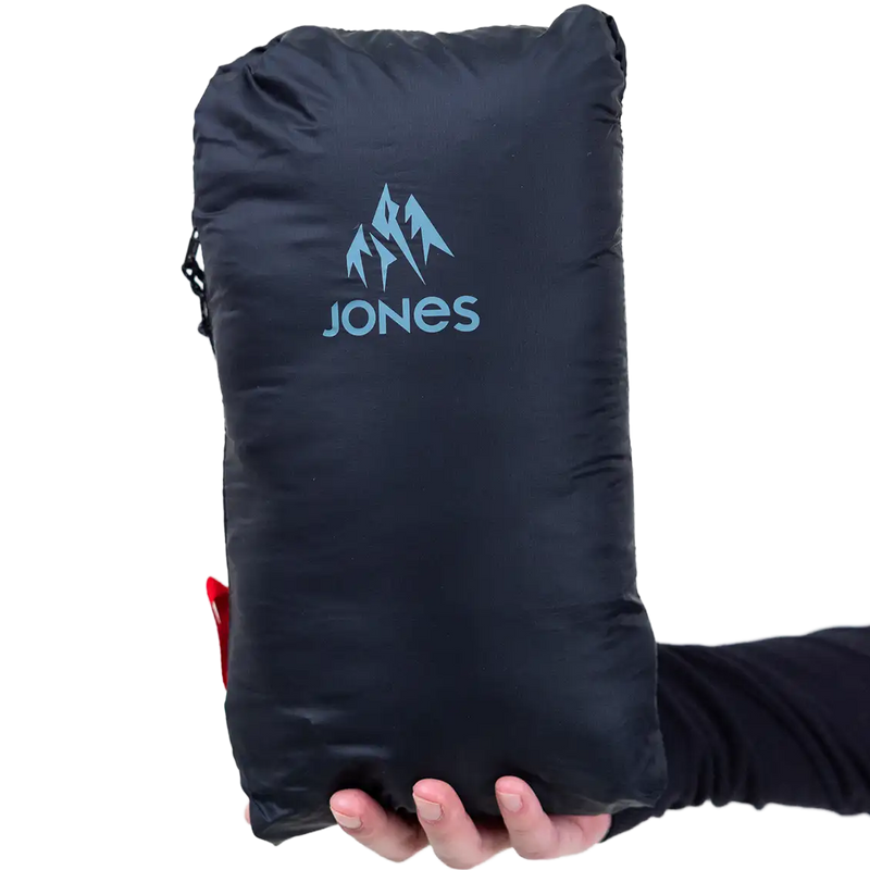 Women's Re-Up Recycled Down Hoodie, Jones Snowboards Women's Re-Up Recycled Down Hoodie alternate image front pocket in stuff sack