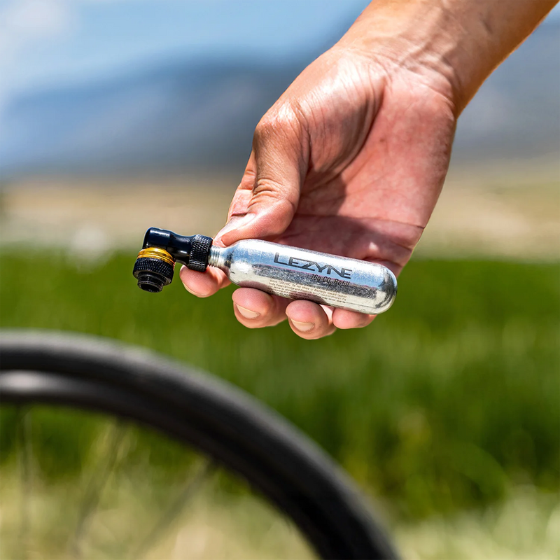 Pocket Drive CO2, Lezyne Pocket Drive Co2 in Black Gold with CO2 lifestyle shot