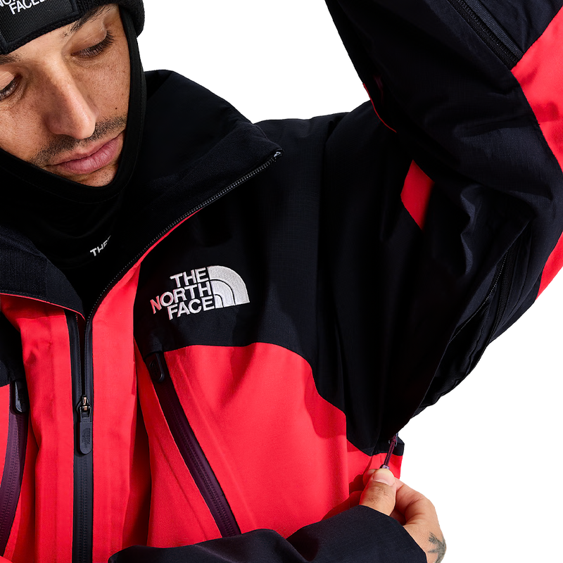 The North Face Men's Snowsquall Jacket in Elevation Red TNF Black underarm vent detail