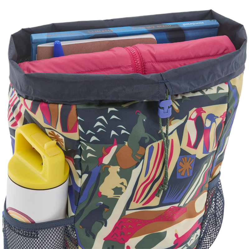 Youth Refugito Day Pack 12L, Patagonia Youth Refugito Day Pack 12L in LCNE-Let's Chat: New Navy loaded with books and water bottle