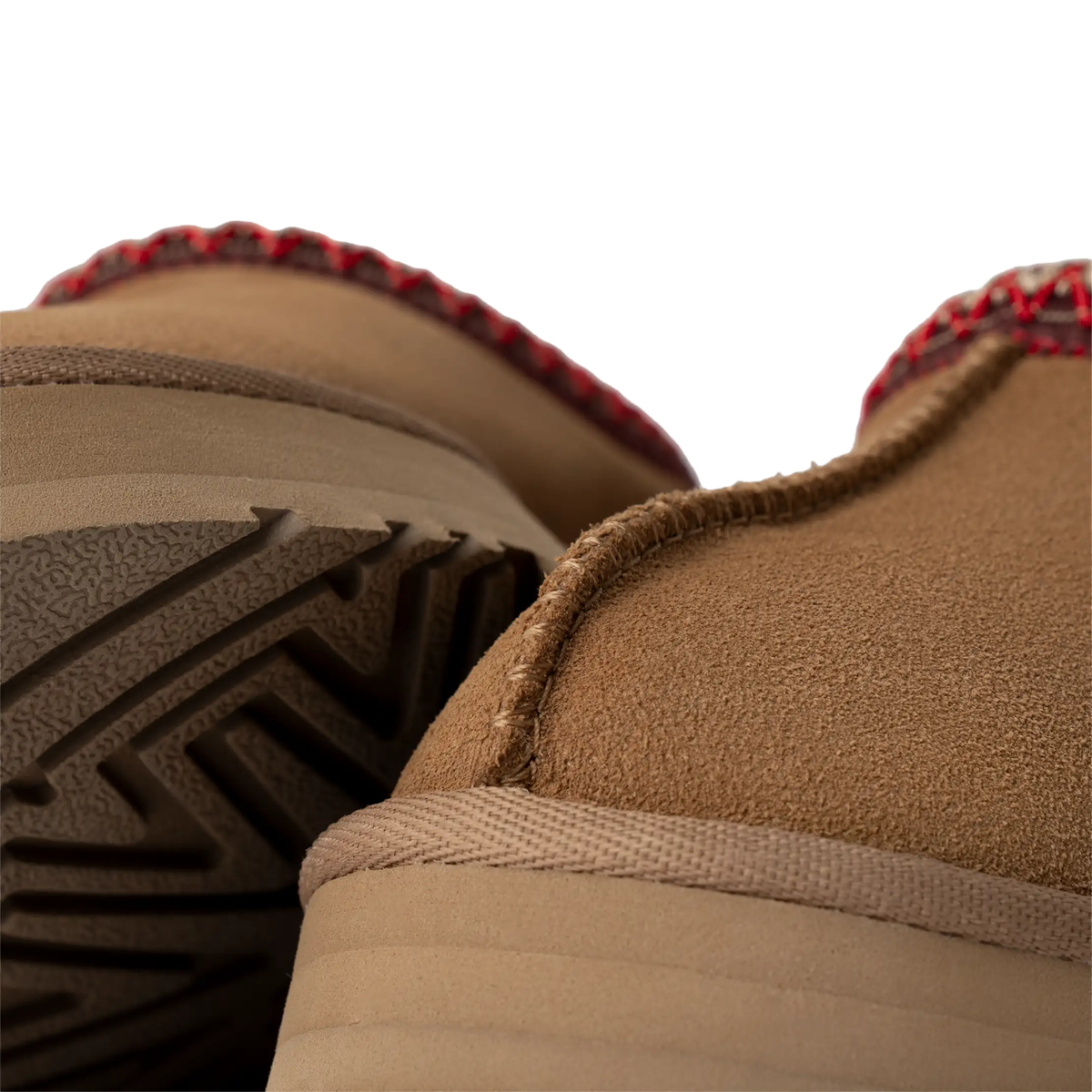 UGG Youth Tazz in Chestnut stitch and sole detail