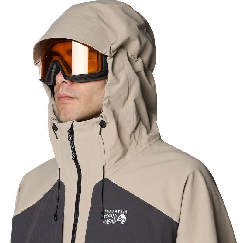Mountain Hardwear Men's Warp Factor 3L Hooded Jacket 3/4 front hood on model