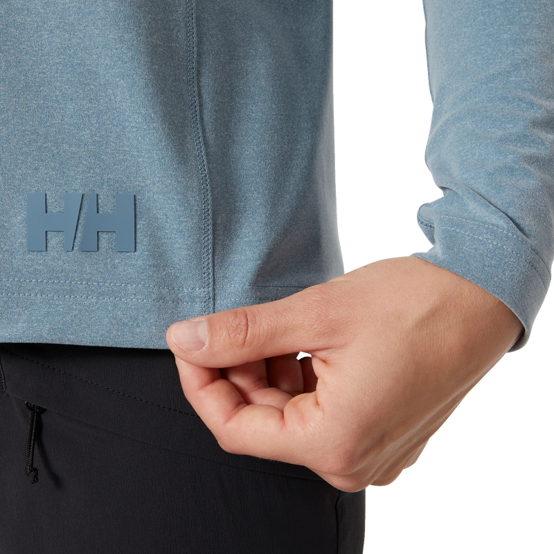 Women's Tyri Knit 1/2 Zip, Helly Hansen Women's Tyri Knit 1/2 Zip in 601-Washed Navy Melange hem and logo
