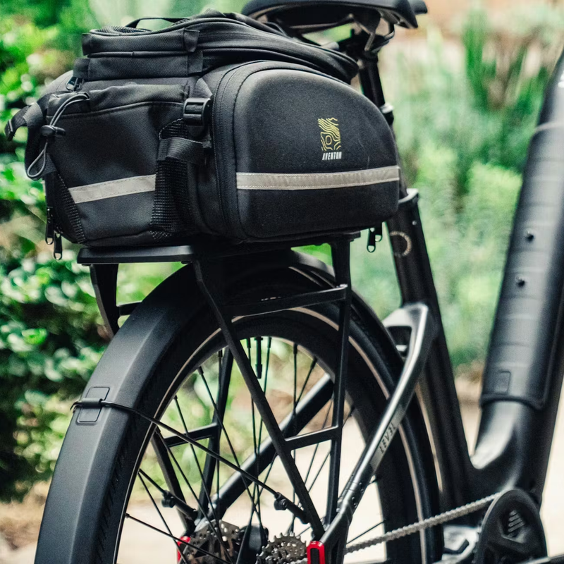 Level 4 ADV Step Over, Aventon Level 4 ADV in Matte Black back right and bag
