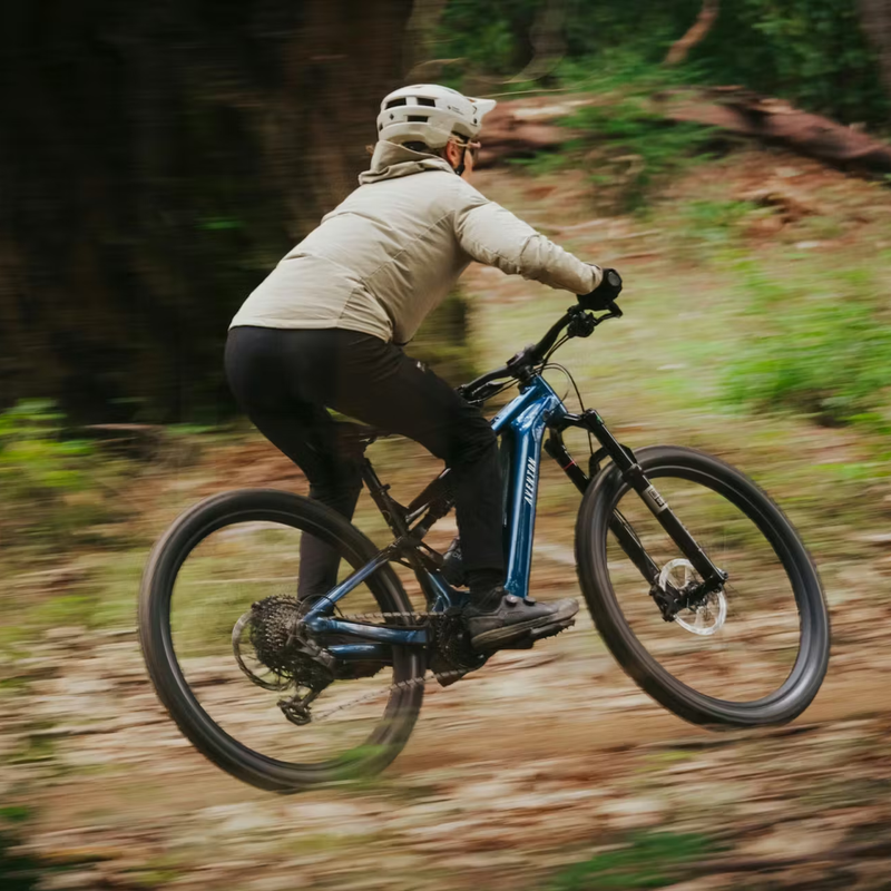 Current ADV, Aventon Current ADV in Blue Onyx with model on trail