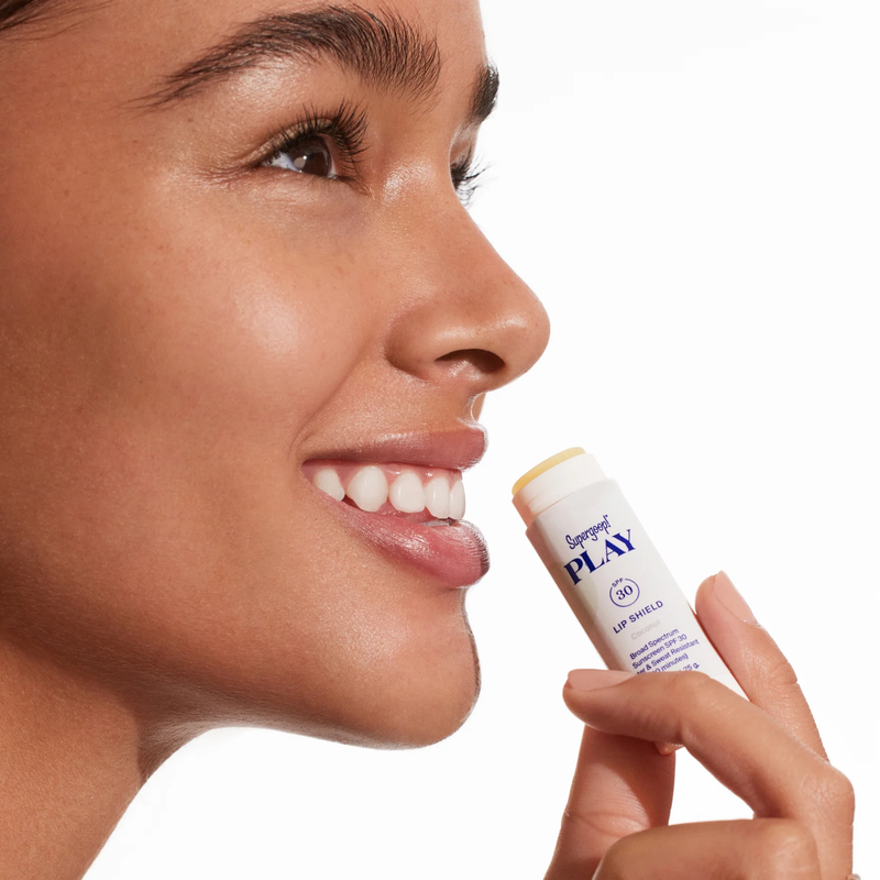 PLAY Lip Shield SPF 30, Supergoop PLAY Lip Shield SPF 30 in hand