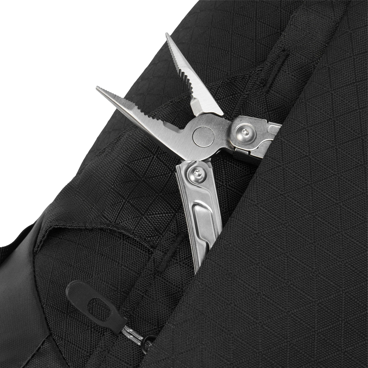 DaKine Heli 2.0 Backpack 12L in Black side tool sipper detail
