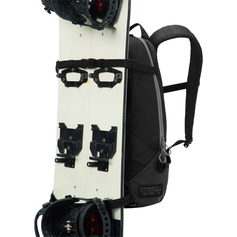 DaKine Heli 2.0 Backpack 12L in Black snowboard strap attachment detail