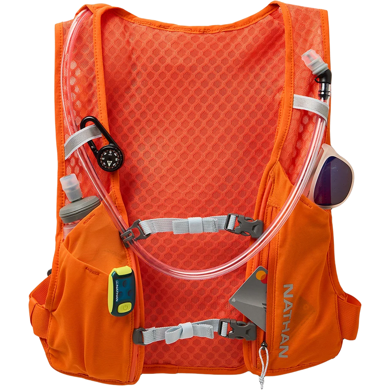 Quick Start 3.0 6L Hydration Pack, Nathan Quick Start 3.0 6L Hydration Pack in Orange Blaze Reflective Silver with pocket and storage detail
