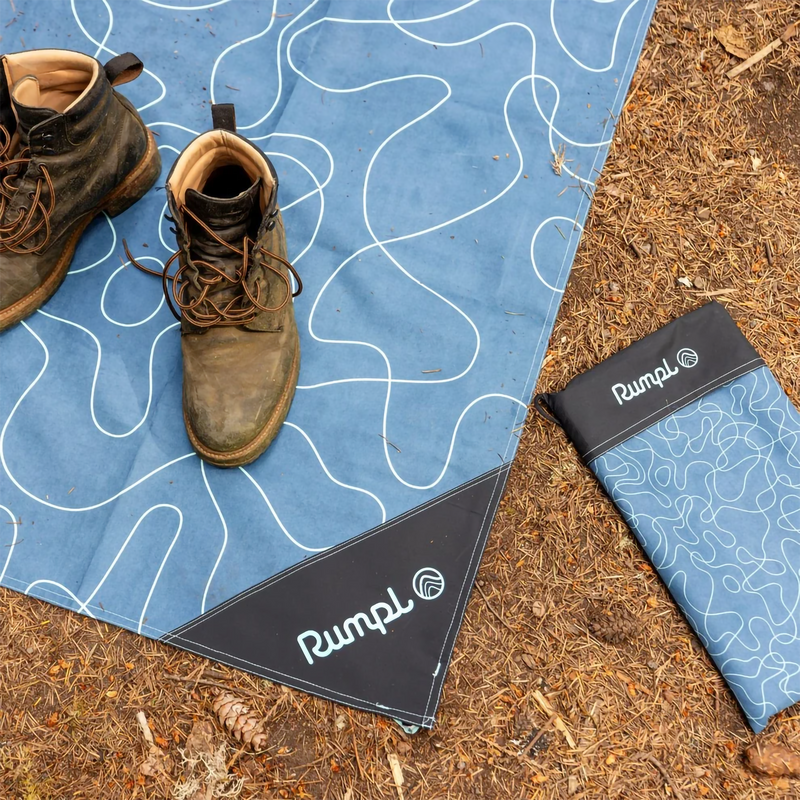 Pack Mat Large, Rumpl Pack Mat Large in Puzzled Blue on ground with boots and case