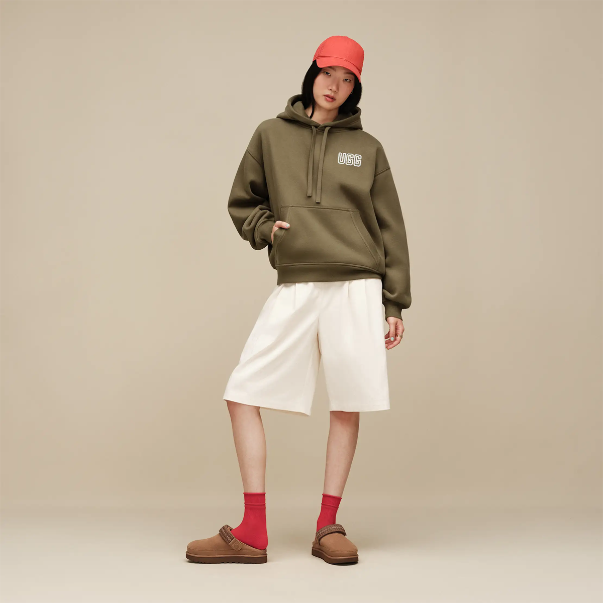 UGG Women's Goldenstar Uggbraid Clog in chestnut on model