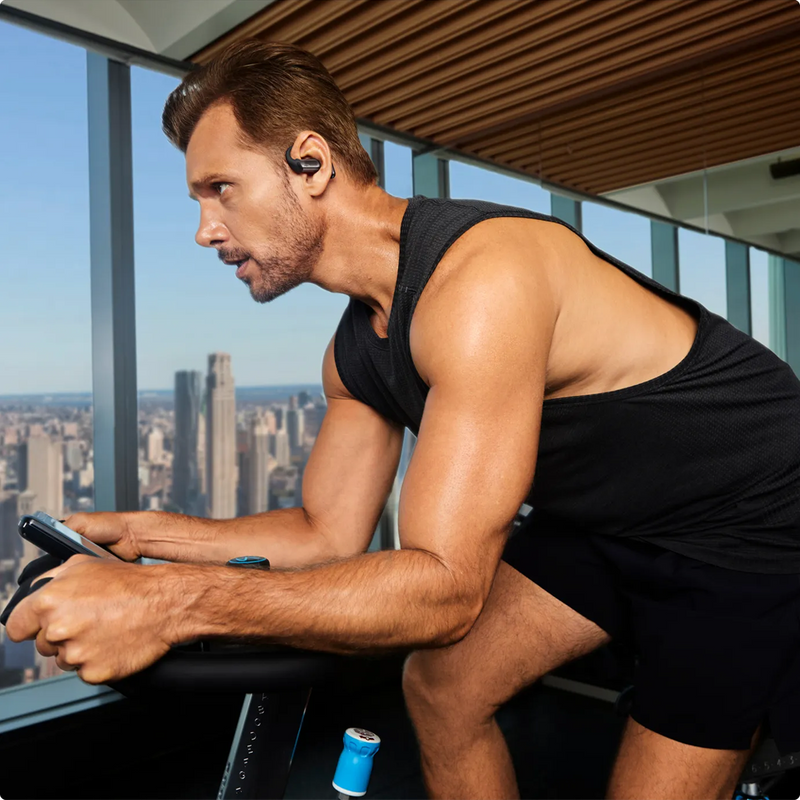 OpenFit Pro, Shokz OpenFit Pro on model in gym