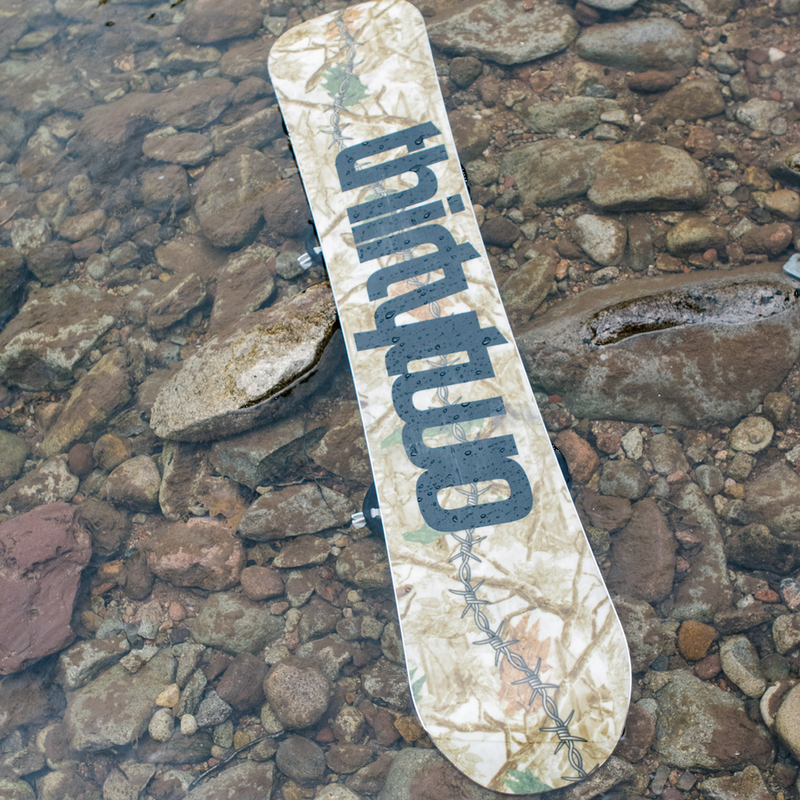 ThirtyTwo T32M base of board product shot in shallow water with rocks