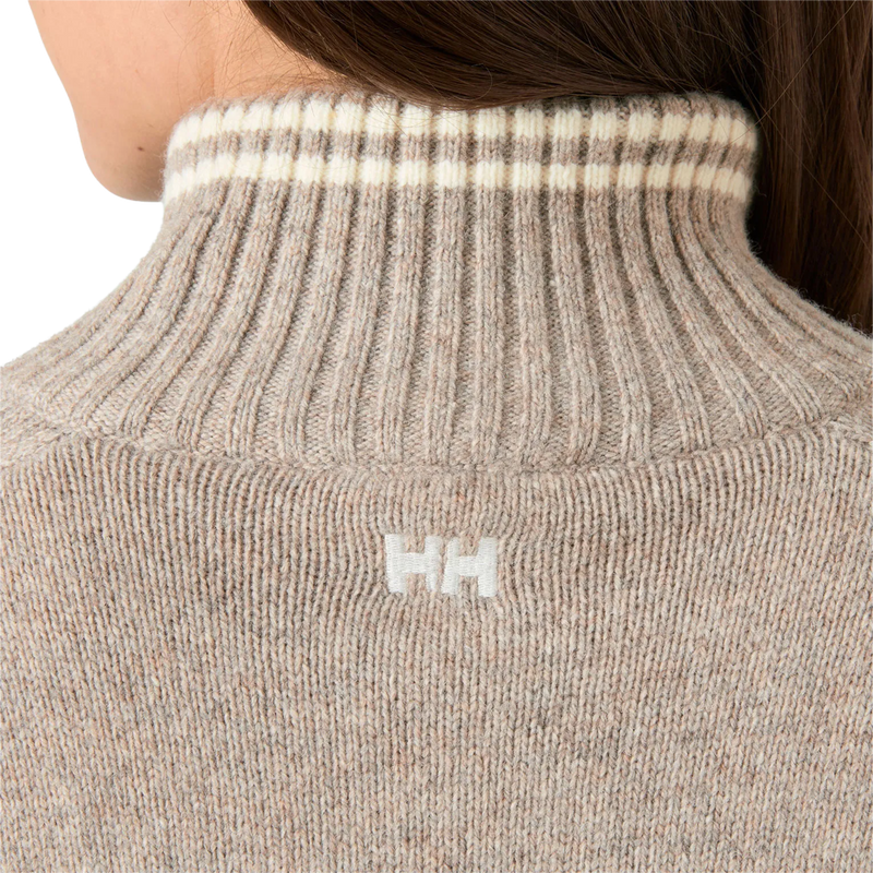 Helly Hansen Women's Apres Knit Sweater in Elmwood Melange logo detail