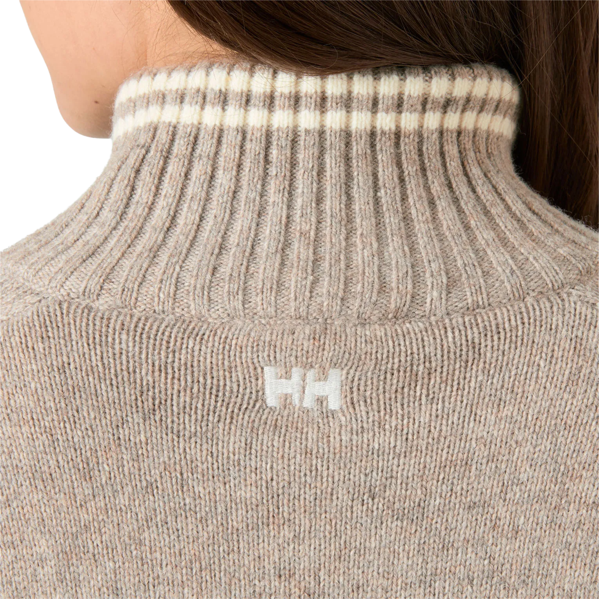 Helly Hansen Women's Apres Knit Sweater in Elmwood Melange logo detail