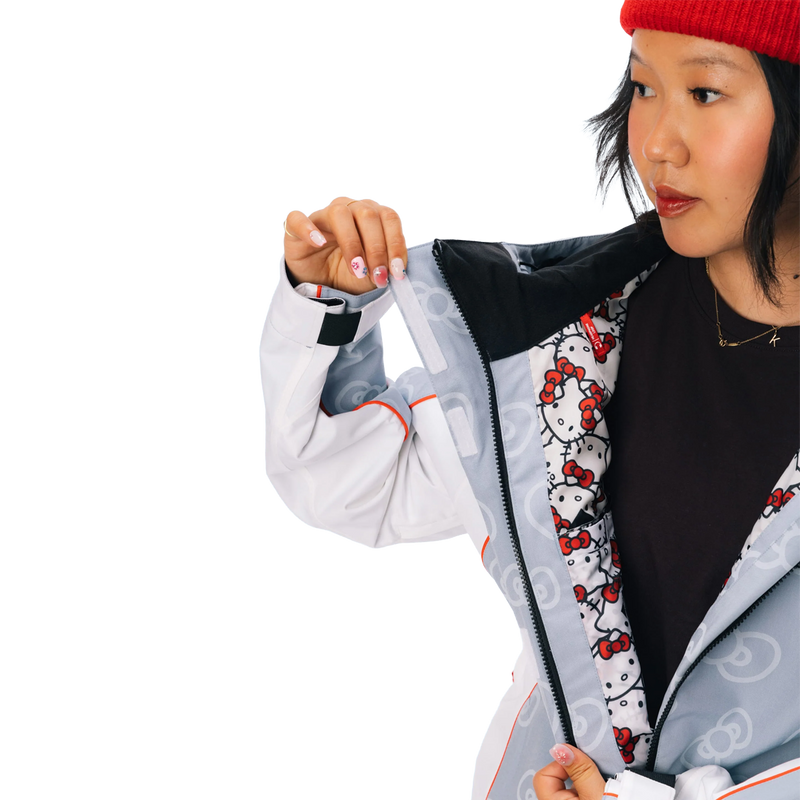 Women's Hello Kitty Lil Bow Jacket, 686 Women's Hello Kitty Lil Bow Jacket in Hello Kitty Denim velcro and zipper display