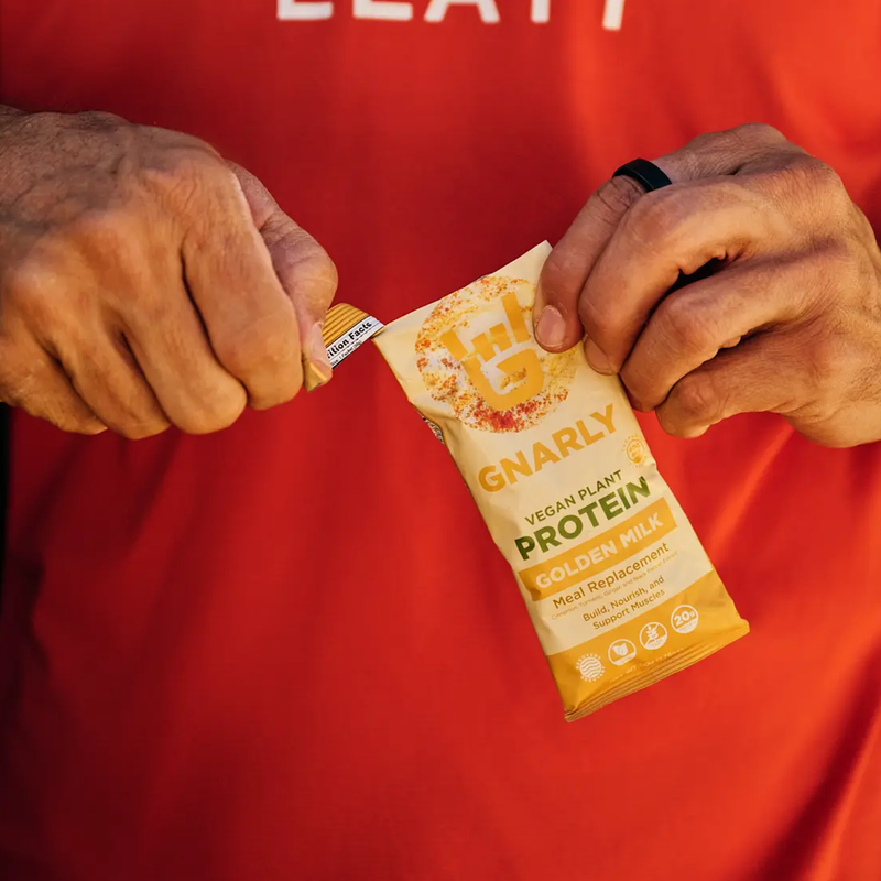 Golden Milk Vegan Protein (Single Serving), Gnarly Sports Nutrition Golden Milk Vegan Protein (Single Serving) in hand