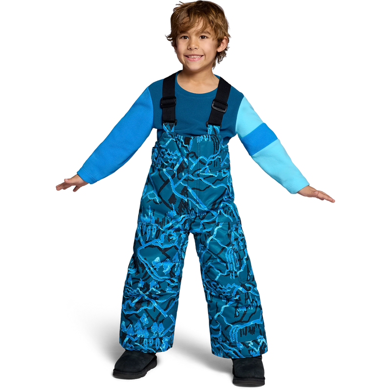 Obermeyer Youth Volt Print Bib Pant in Magic Forest on model