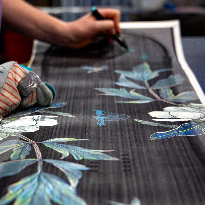 Never Summer Women's Cascade artist drawing the topsheet design