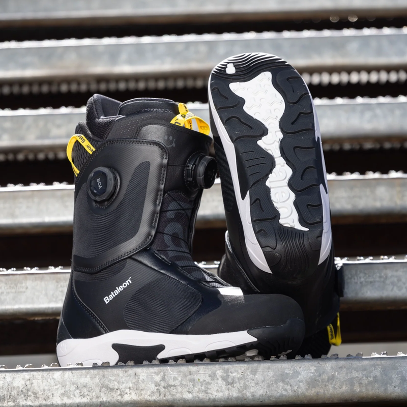 Bataleon Men's Rave Double BOA boots on steps with one uptight side facing and one with sole facing out