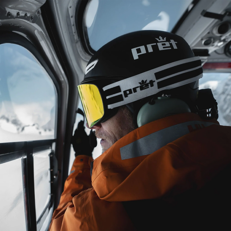 Pret Fury on skiier in helicopter looking out window
