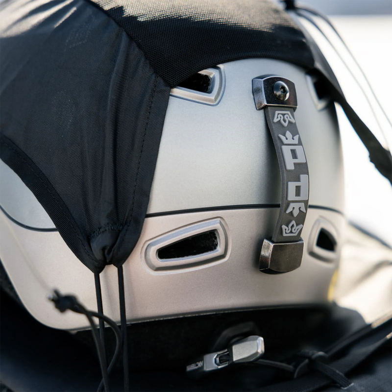 Pret Women's Sol helmet closeup in helmet storage on backpack