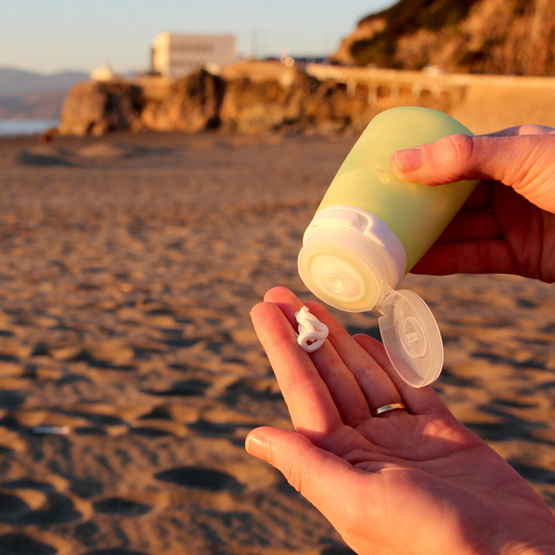 GoToob+ Squeezable Silicone Travel Bottle 1.7 oz, HumanGear GoToob+ Squeezable Silicone Travel Bottle in hand